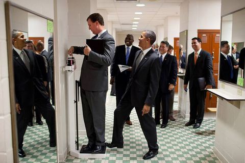 President Obama with foot on the scale, practical joke