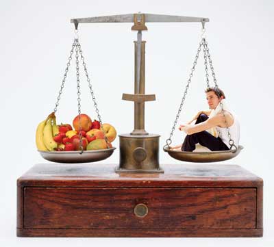 Balance scale with fruit